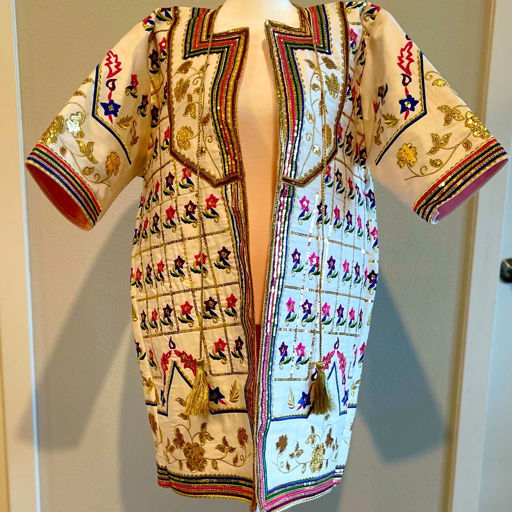 A unique elegant hand embroidered North African open front vest